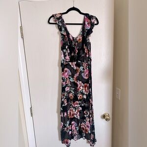 Floral dress, Ties in the back, Ruffle detailing on the bottom